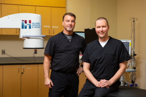 Dr. Robert Billow and Dr. Jeffrey Krause in the Island Sports & Spine Clinic.
