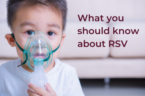 Child with RSV using a breathing treatment.