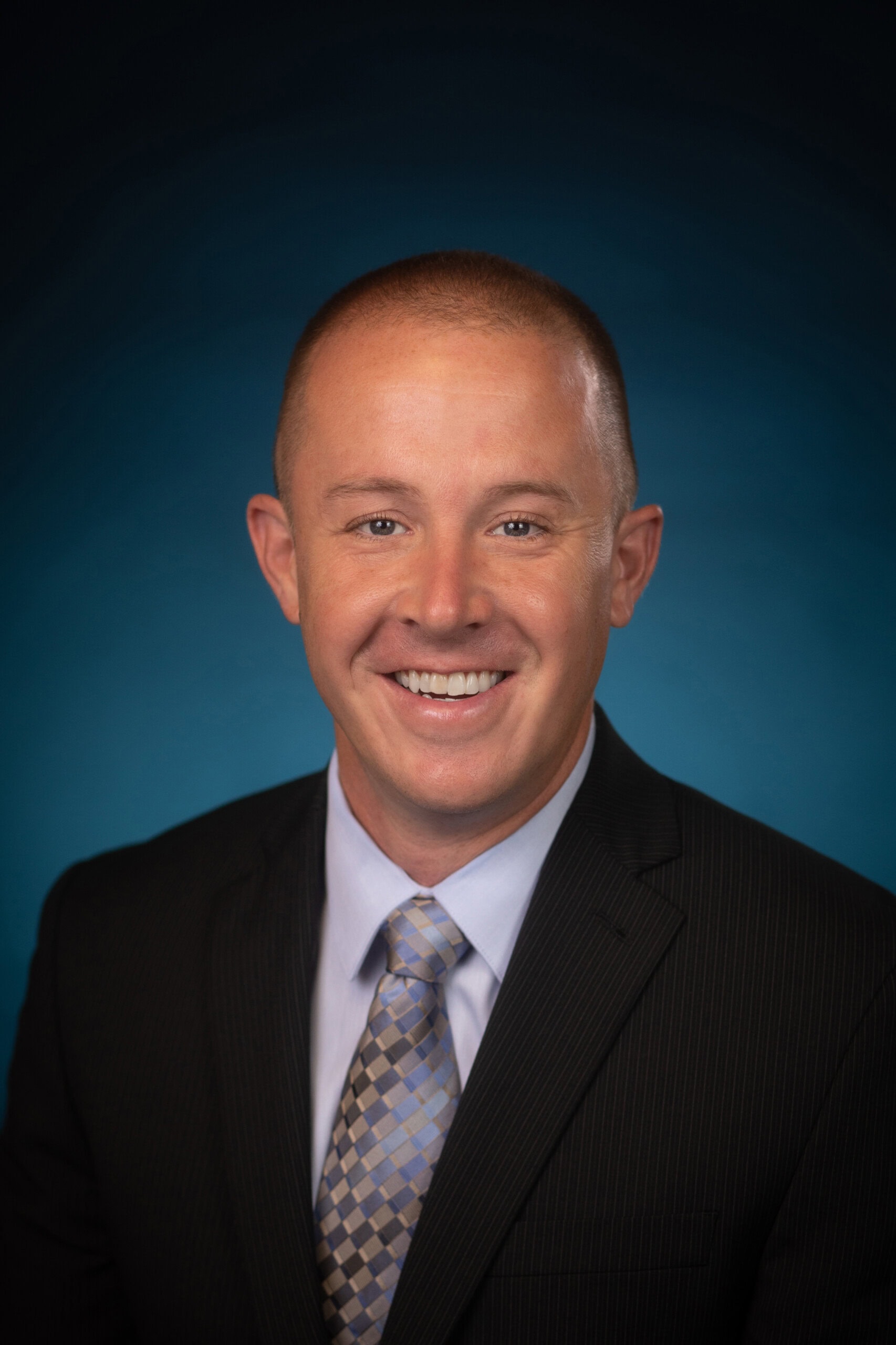 Island Urologist Brock Boehm smiling at the camera.