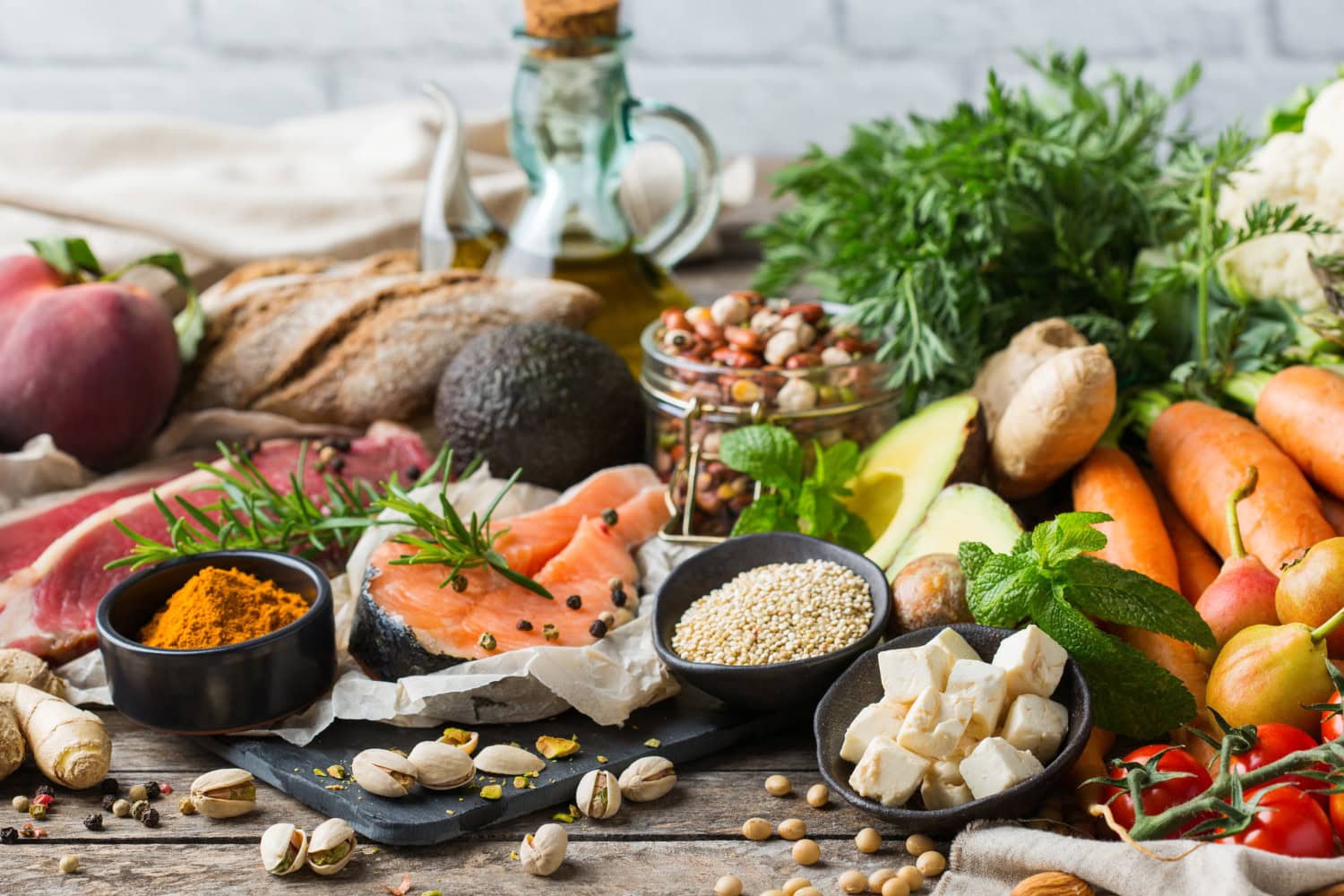spread of healthy food on wooden table