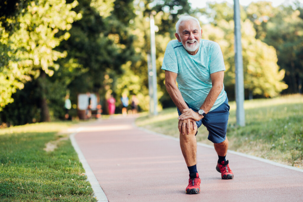 Man stretching outside